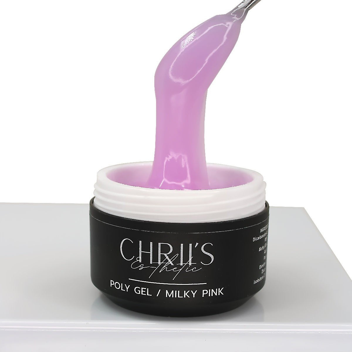Polygel Milky Pink CHRIIS‑ESTHETIC prélevé dans son pot, montrant sa couleur rose laiteux, vendu par mon style mes ongles